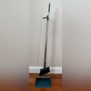 Orange and Blue broomstick and dust pan